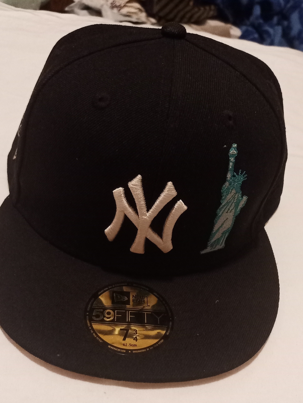 New Era Black Fitted NY Yankees Cap with Teal Statue of Liberty Patch